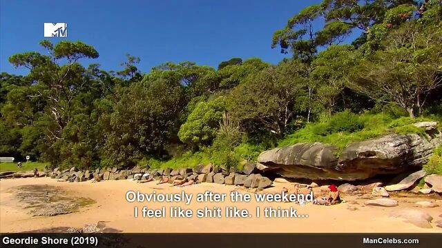 Joel Corry and Scotty T sunbathing naked on a beach