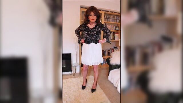 Short white pleated skirt