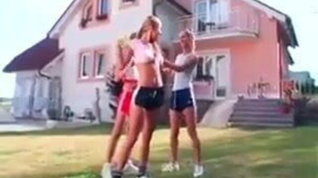 Girls in Adidas shine shorts and sports shoes